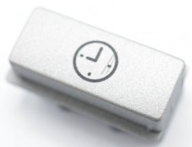 Miele Button - Cap Cleanst Metal Clock